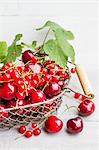 An arrangement of red summer fruits