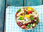 Pasta salad with Serrano ham and tomatoes