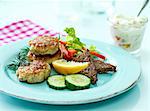 Fish burgers with wholemeal bread and a dip