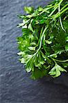 Fresh parsley on a slate surface