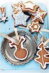 Various gingerbread biscuits as Christmas tree decorations