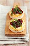 Vol-au-vents filled with feta cheese, dried tomatoes and sage