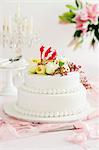 A wedding cake decorated with flowers