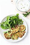 Courgette cakes with a rocket salad