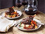 Lamb shanks with mashed potatoes, parsnips, gravy and wine