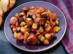 Fried potatoes with sausage, peppers and onions