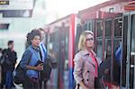 People boarding train