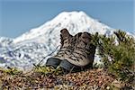 Tourist boots and volcano on Kamchatka Peninsula (Russia).