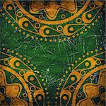 Abstract yellow ornament on grunge green background.