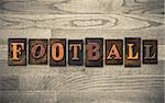 The word "FOOTBALL" written in vintage wooden letterpress type.