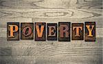 The word "POVERTY" written in vintage wooden letterpress type.