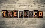 The words "THE CLOUD" written in vintage wooden letterpress type.