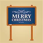 Merry Christmas Greeting on Green Chalkboard or Blackboard