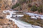 Cache la Poudre River at Big Narrows west of  Fort Collins in northern Colorado - winter scenery with a partially frozen river