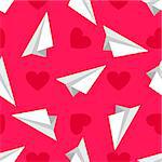 Airplanes made of white paper  and red hearts on the pink background.