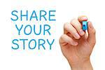 Hand writing Share Your Story with blue marker on transparent wipe board.