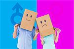Couple wearing sad face boxes on their heads against female gender symbol