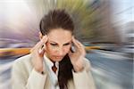 Woman with headache against new york street