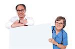 Two matured doctors holding white banner ad. All on white background
