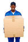 Delivery guy holding big parcel and smiling isolated on white