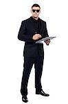 Male bouncer holding clipboard isolated against white background