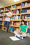 Students reading in the library at the university