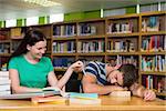 Students studying together in the library at the university