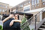 Portrait of Bride and Groom Hugging Outdoors, Hamilton, Ontario, Canada