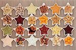Large crisp and dip snack food selection in porcelain star dishes over bamboo  background.