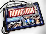 Addiction - Diagnosis on the Display of Medical Tablet and a Black Stethoscope on White Background.