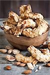 Homemade almond crescent cookies on old wood background