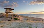 Early summer morning  at Wanda beach with golden sunlight falling on the Wanda  surf lifeguard tower