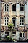 Old weathered wall with vintage windows, Gent, Belgium