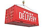 Fast Delivery - Red Cargo Container hoisted by hook,Isolated on White Background.