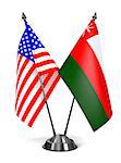 USA and Oman - Miniature Flags Isolated on White Background.