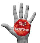 Stop Malnutrition Sign Painted - Open Hand Raised, Isolated on White Background