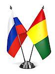 Russia and Guinea - Miniature Flags Isolated on White Background.