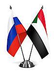 Russia and Sudan - Miniature Flags Isolated on White Background.