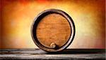 Round wooden barrel on a colored background