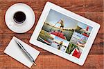 reviewing pictures of stand up paddling featuring a senior male on a digital tablet with a cup of coffee. All screen pictures copyright by the photographer with the same model (self).