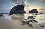 Two of the largest rocks among the many rock formations at Glasshouse Rocks taken just after sunrise with foreground rocks showing crystalised forms.