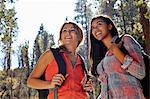 Two young adult females hiking in forest, Los Angeles, California, USA