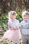 Boy and girl with Easter eggs