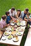 Family and friends gather for vacation picnic