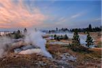 Sunrise at West Thumb Geyser Basin with Yellowstone Lake in the background in Autumn, Yellowstone National Park, Wyoming, USA