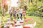 Group of friends enjoying garden party