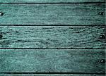 Background of Turquoise Old Wooden Deck Board with Nail Heads closeup. Horizontal View