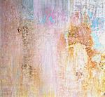 Beige, Blue and Pink Damaged Obsolete Cement Wall Background closeup