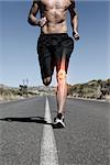 Digital composite of Highlighted knee bone of running man