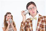 Geeky hipsters using string phone on white background